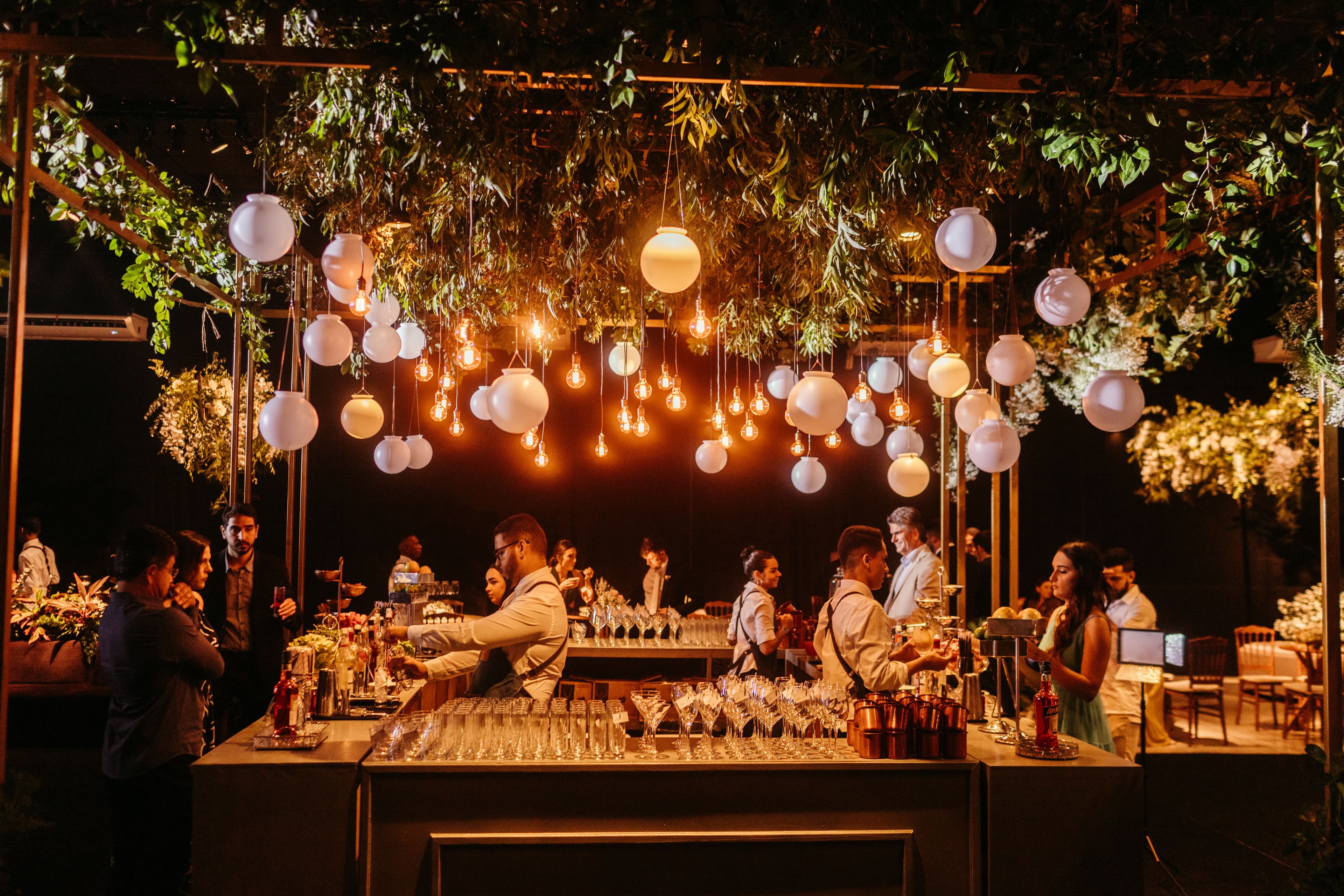 Upscale wedding reception bar with ambient lighting
