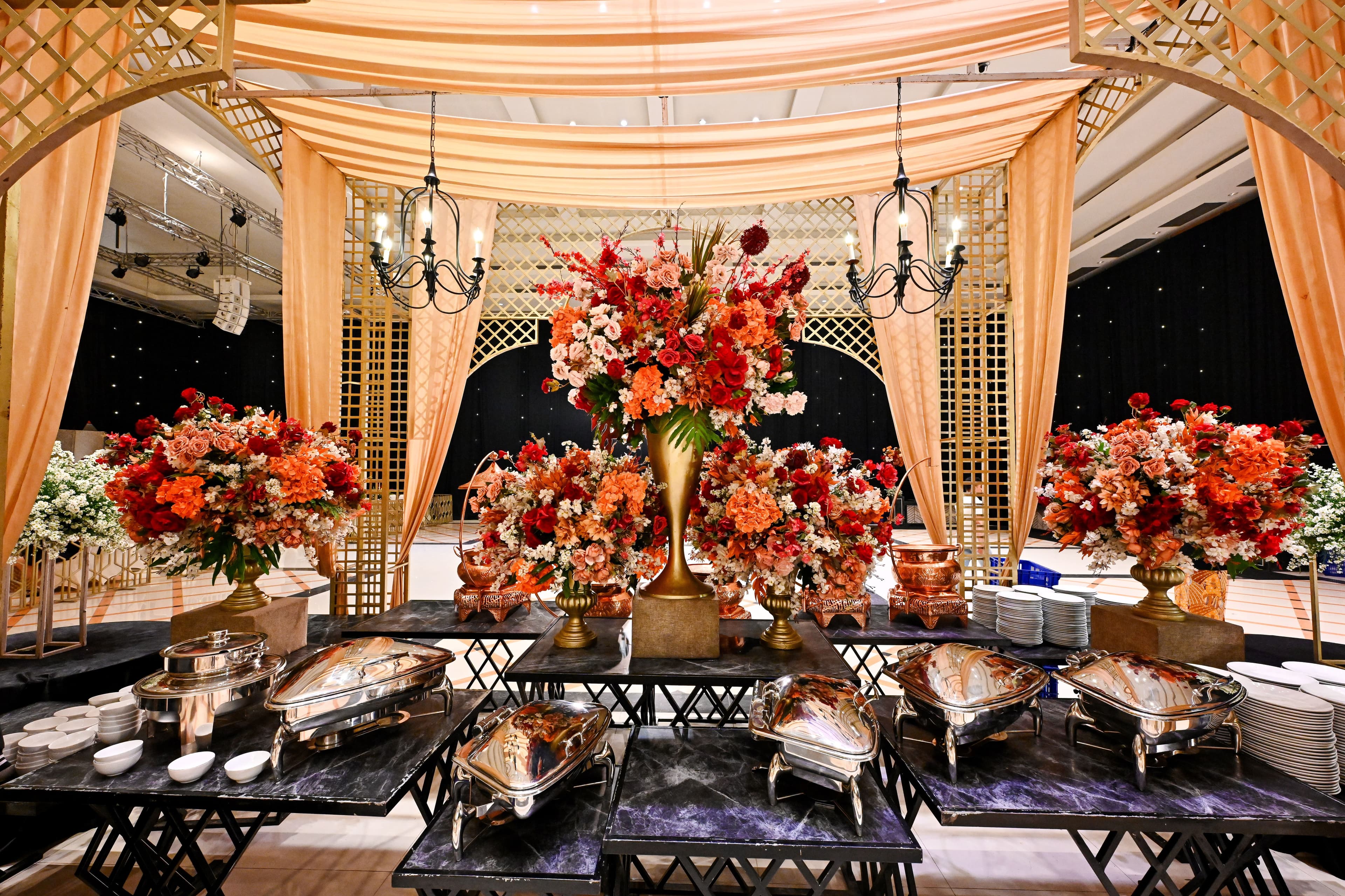 Beautifully decorated wedding reception venue with floral arrangements